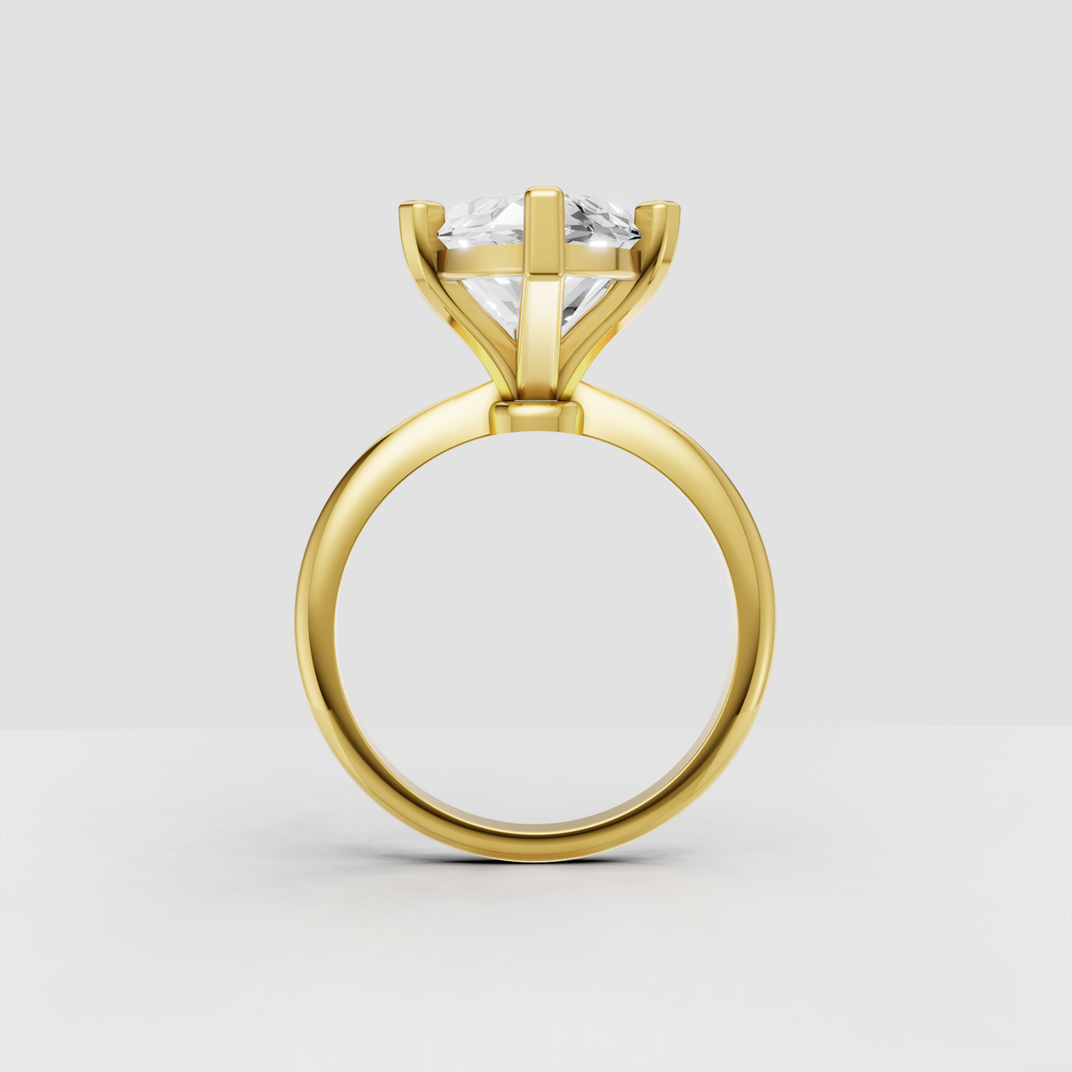 Yellow gold marquise diamond ring with cathedral shoulders