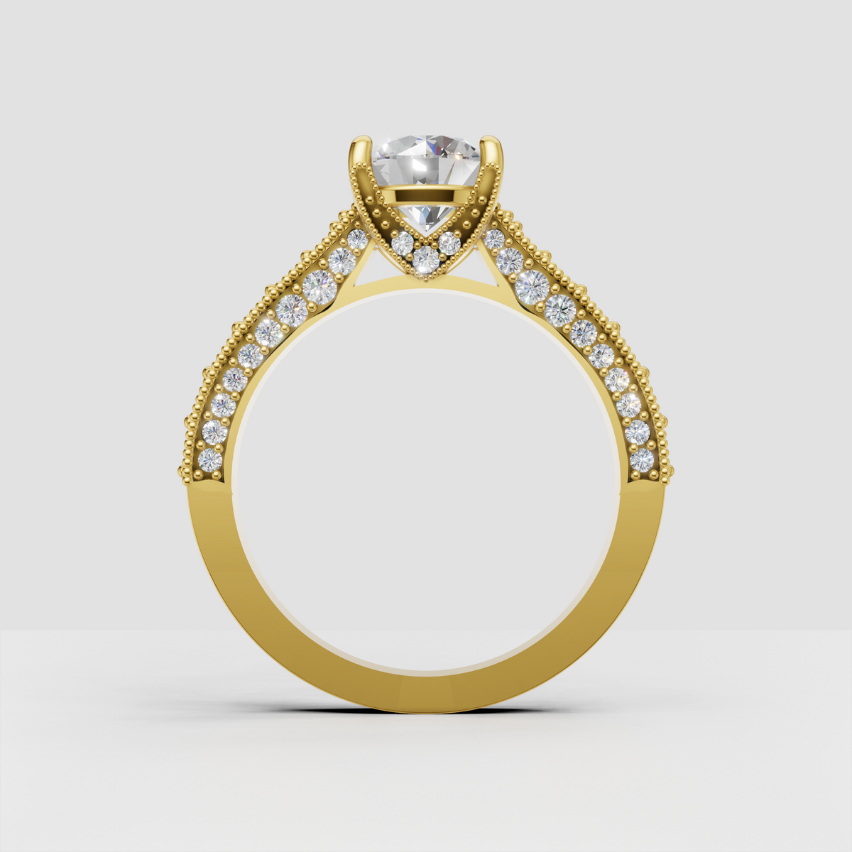 Round diamond engagement ring with pavé shoulders