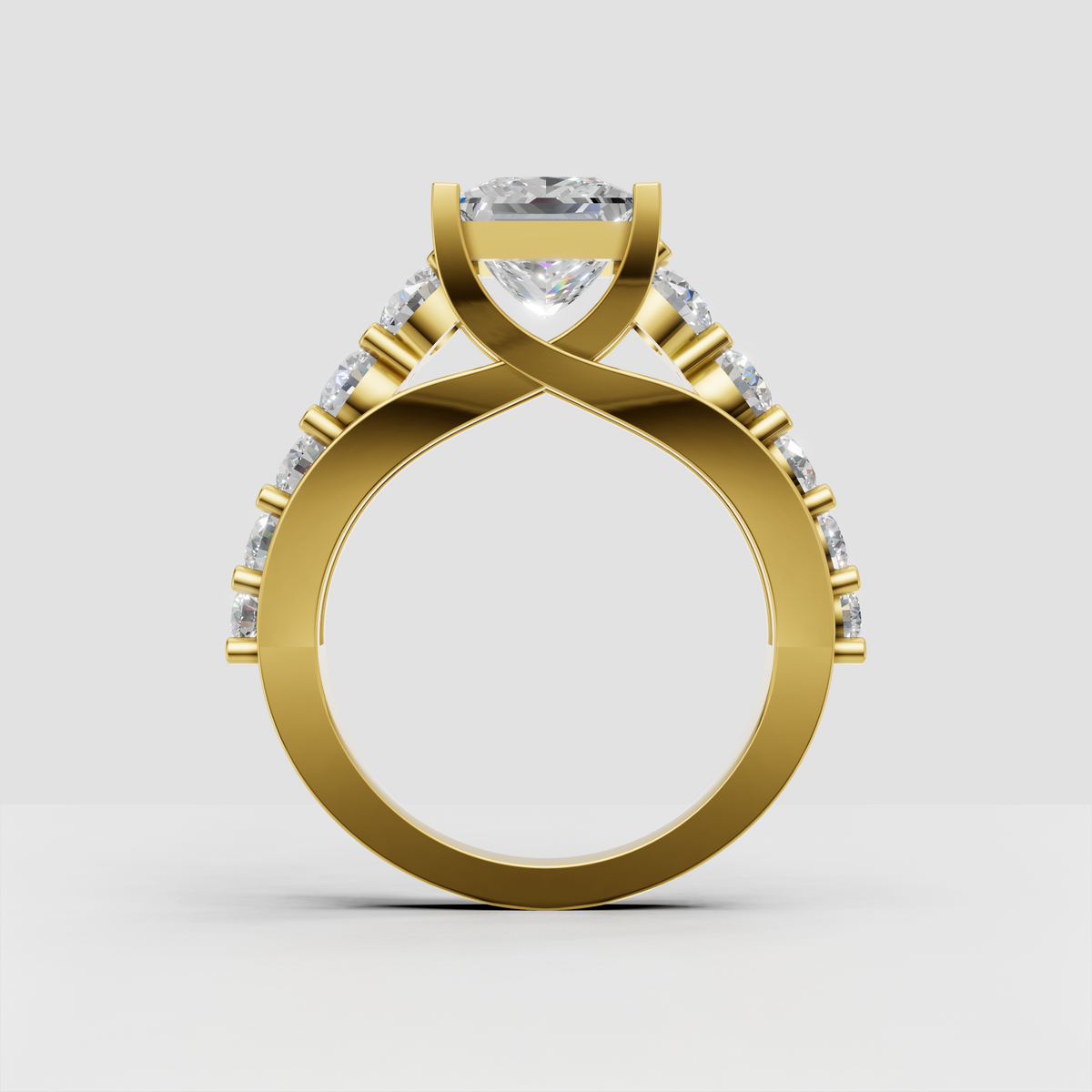 Princess diamond ring featuring cathedral style setting and diamond accent band