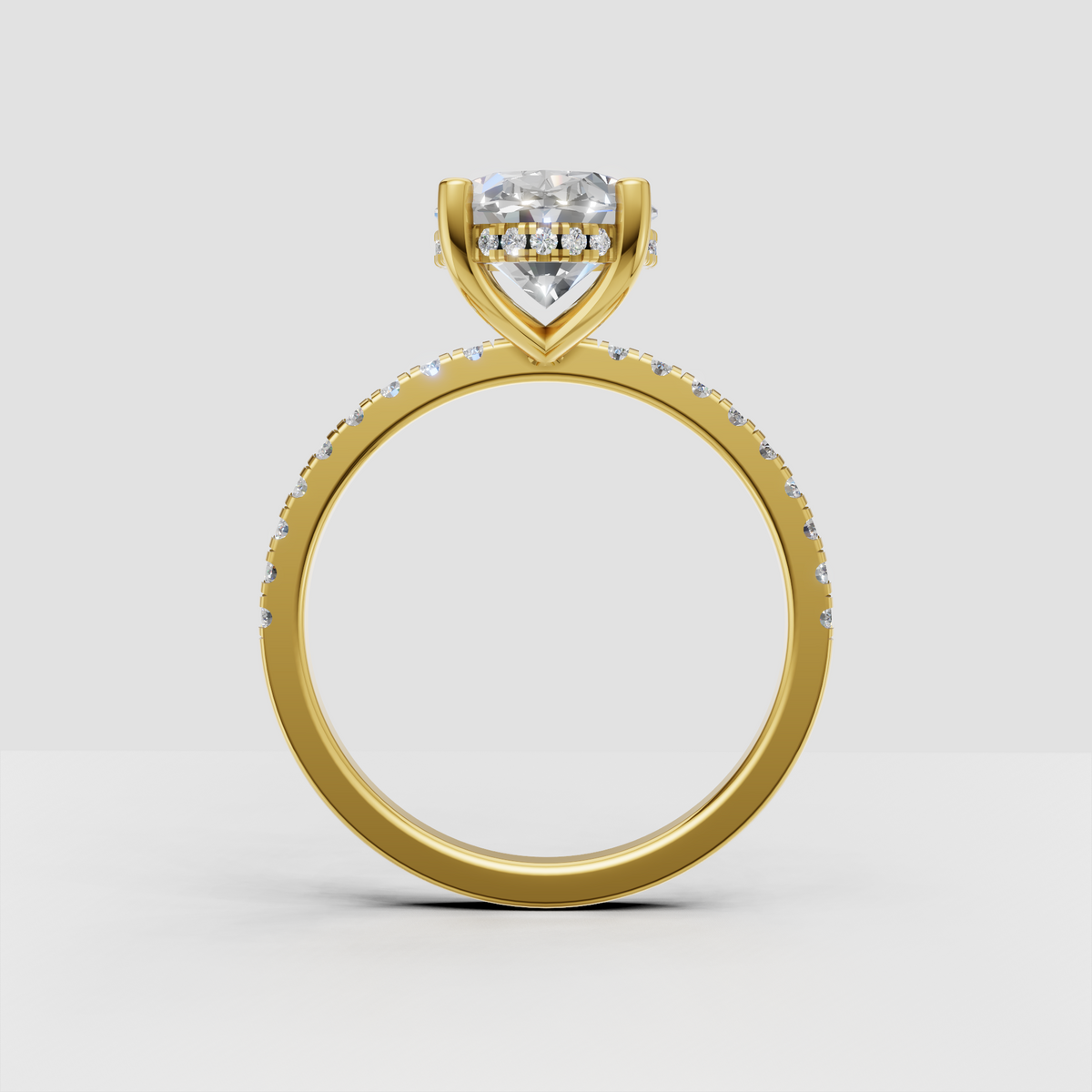 Oval diamond hidden halo ring in a refined setting