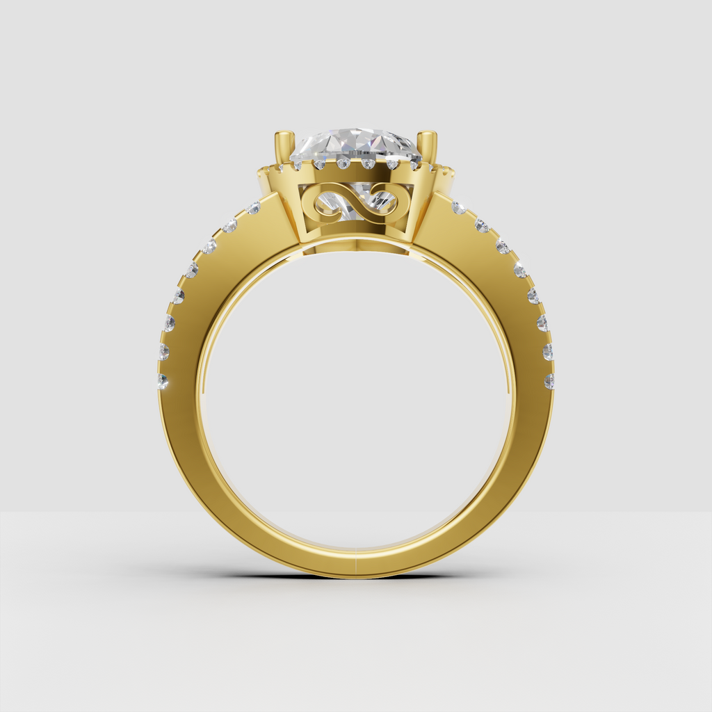 Pear cut diamond ring with round diamond halo and pavé shoulders
