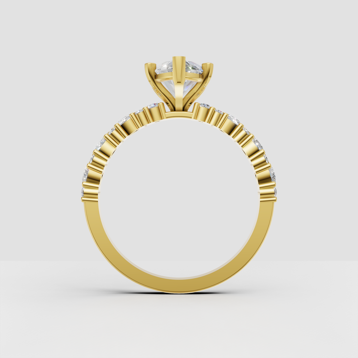Yellow gold pear diamond engagement ring with split shoulders