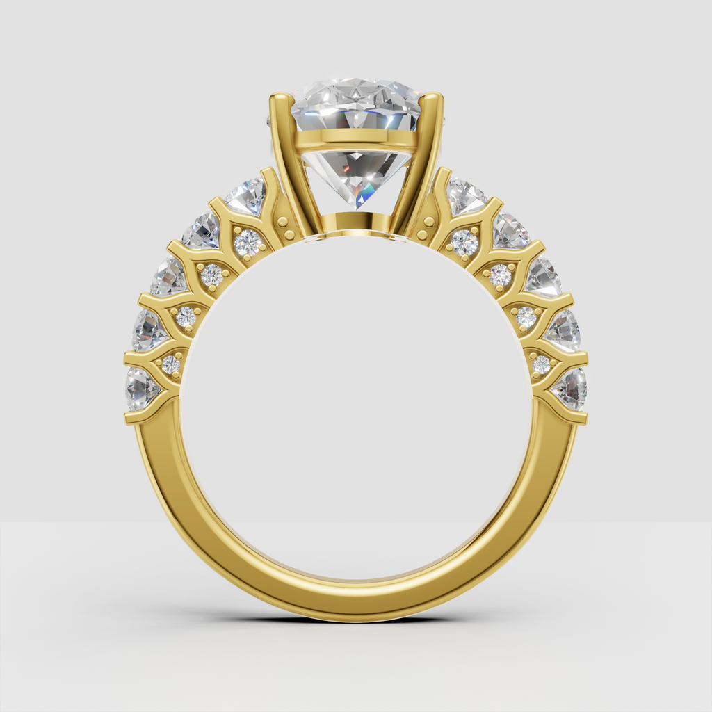 Pear cut diamond ring with marquise and round halo stones