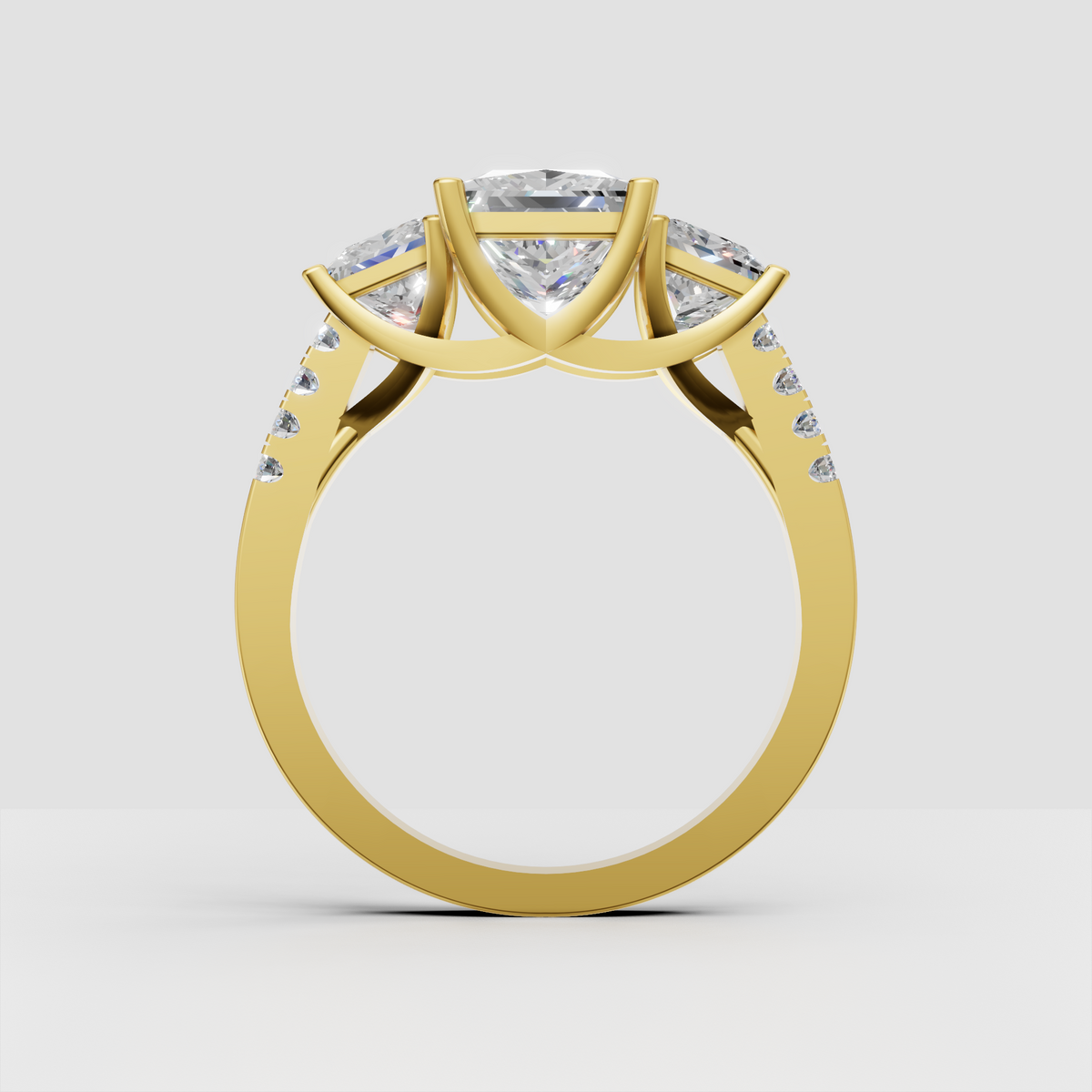 Yellow gold princess cut three stone bridal engagement ring