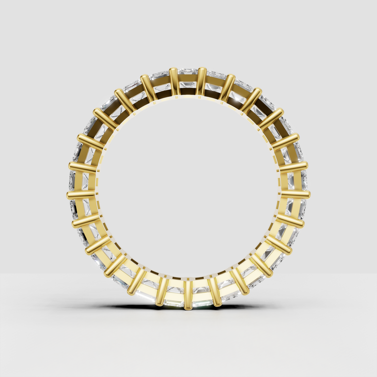 Full eternity band featuring elongated emerald cut diamonds