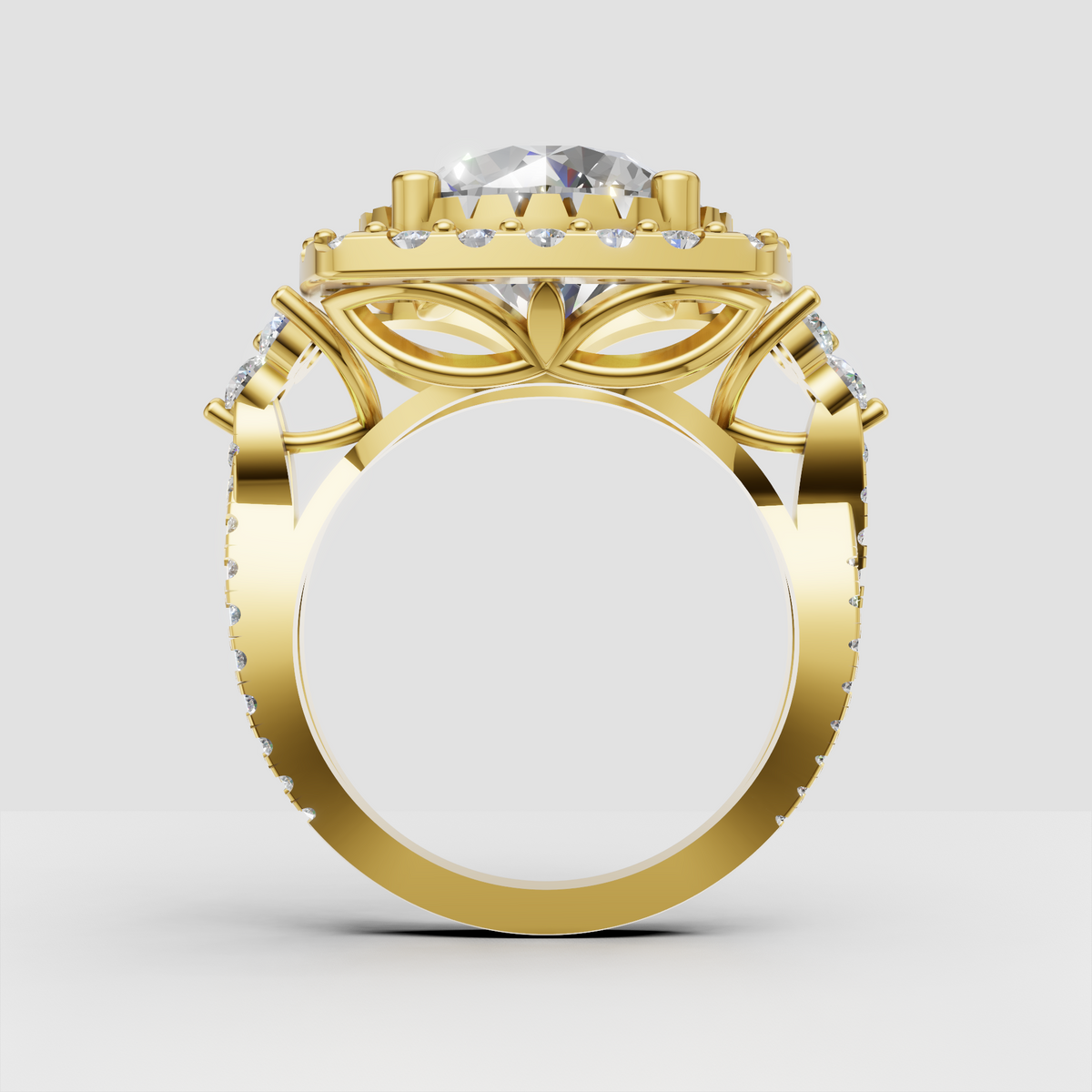 Round center diamond surrounded by a sparkling halo in yellow gold