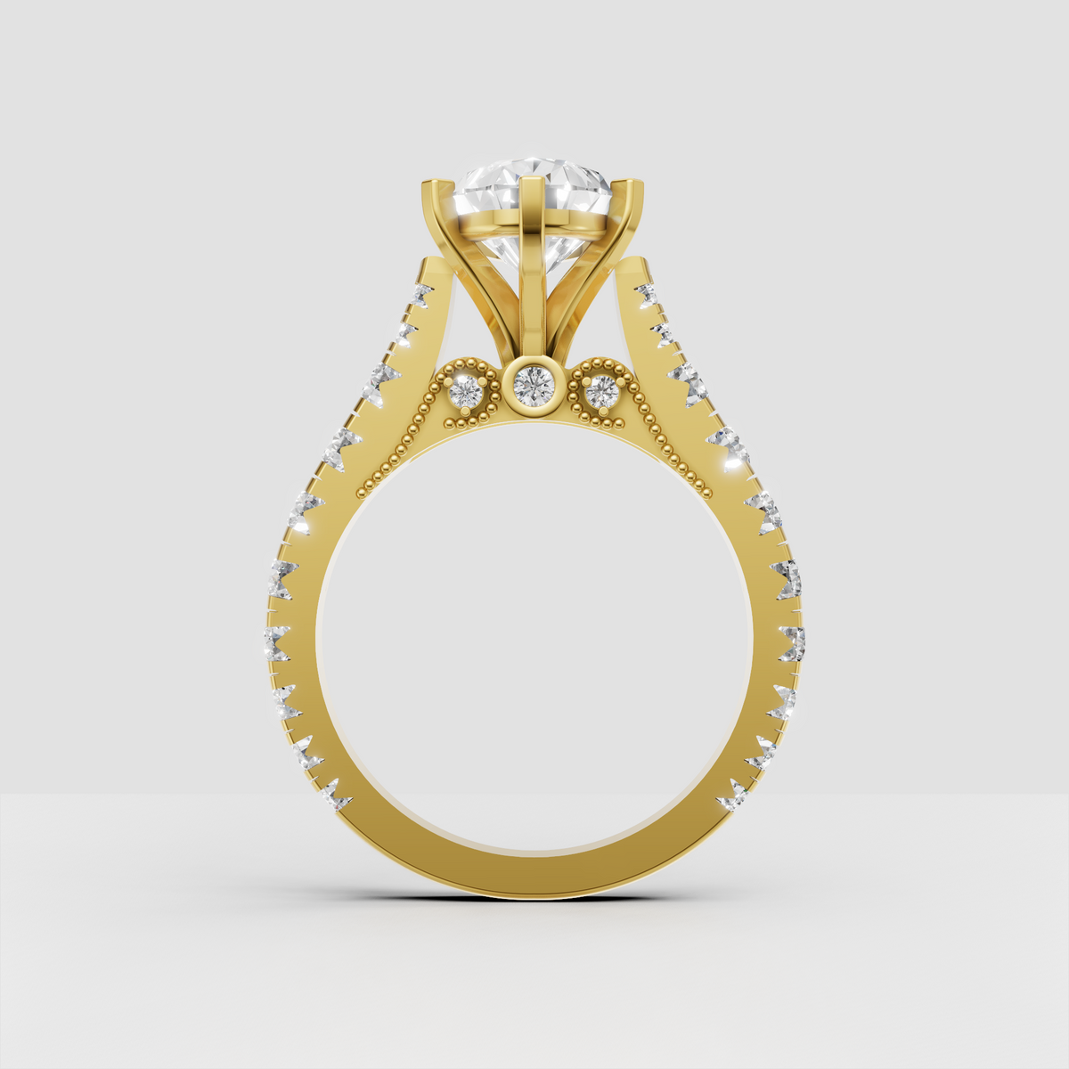 Vintage-inspired pear engagement ring with sparkling shoulder stones
