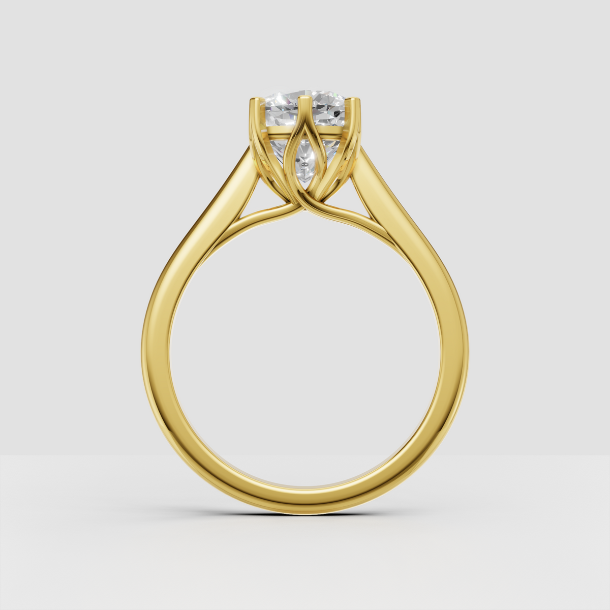 Cushion-cut center stone engagement ring with polished gold band