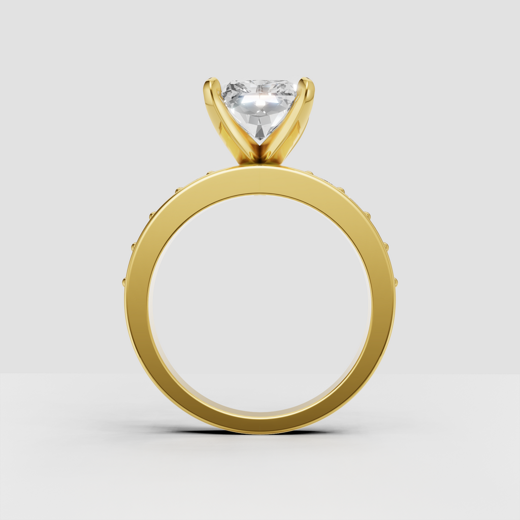 Four-prong radiant diamond engagement ring in yellow gold