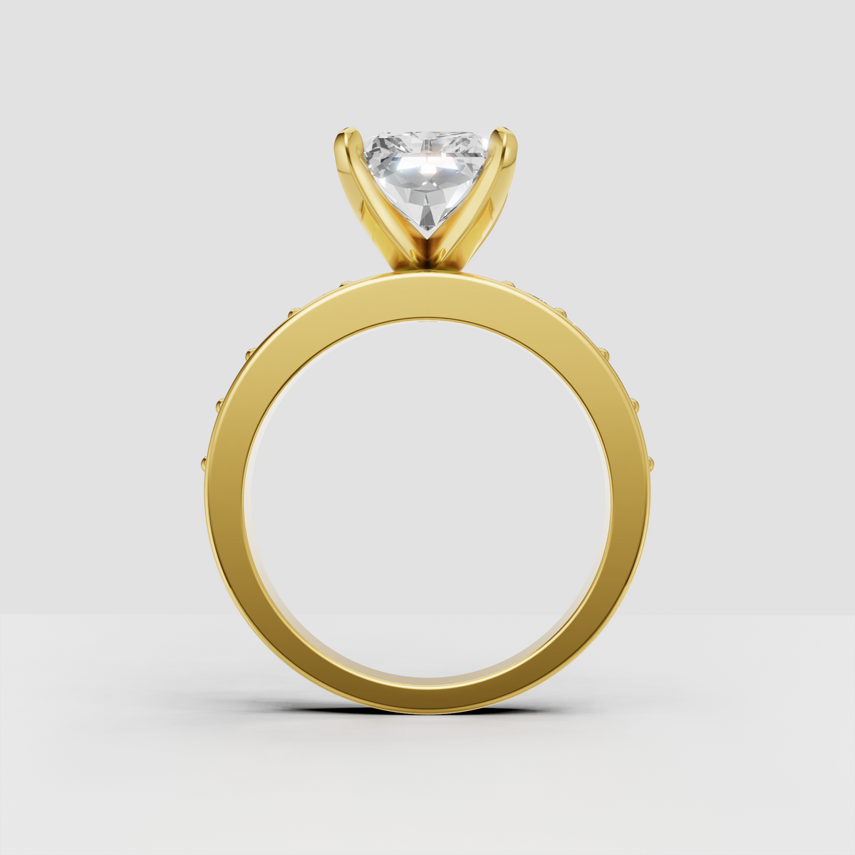 Four-prong radiant diamond engagement ring in yellow gold