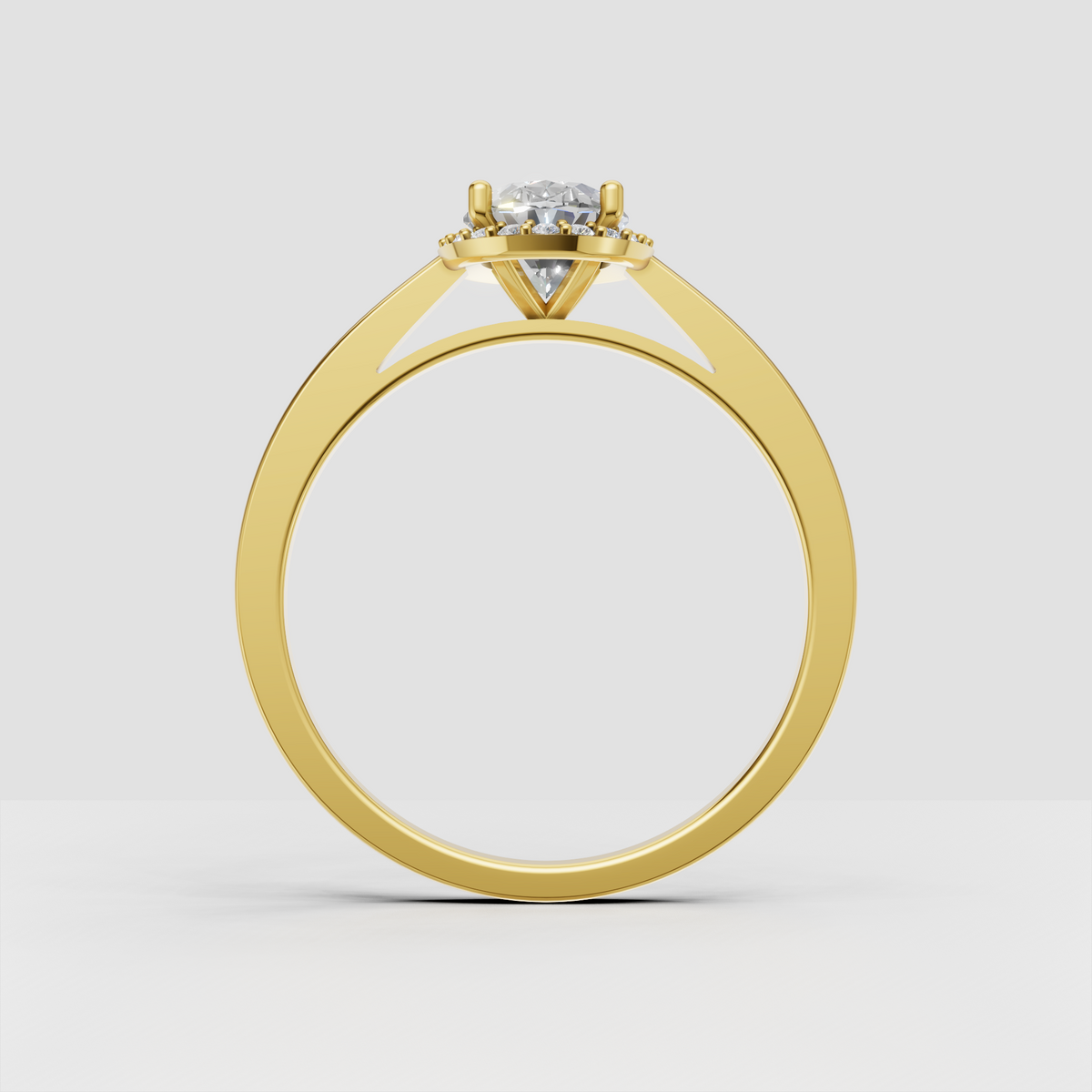 Elegant oval engagement ring surrounded by a round diamond halo