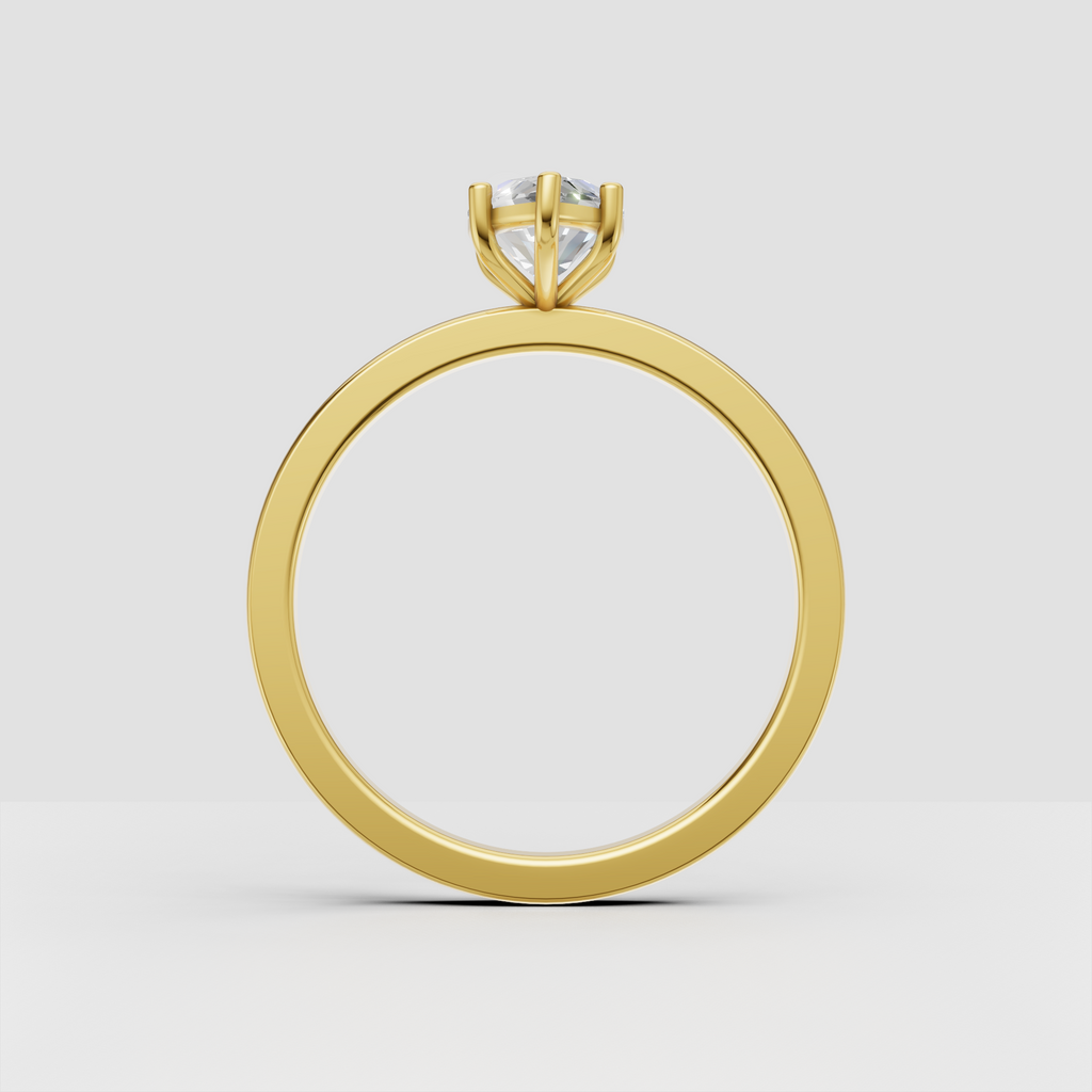 Yellow gold marquise cut diamond solitaire ring