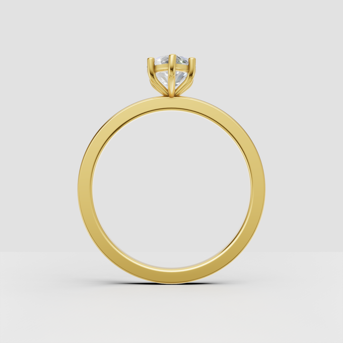 Yellow gold marquise cut diamond solitaire ring