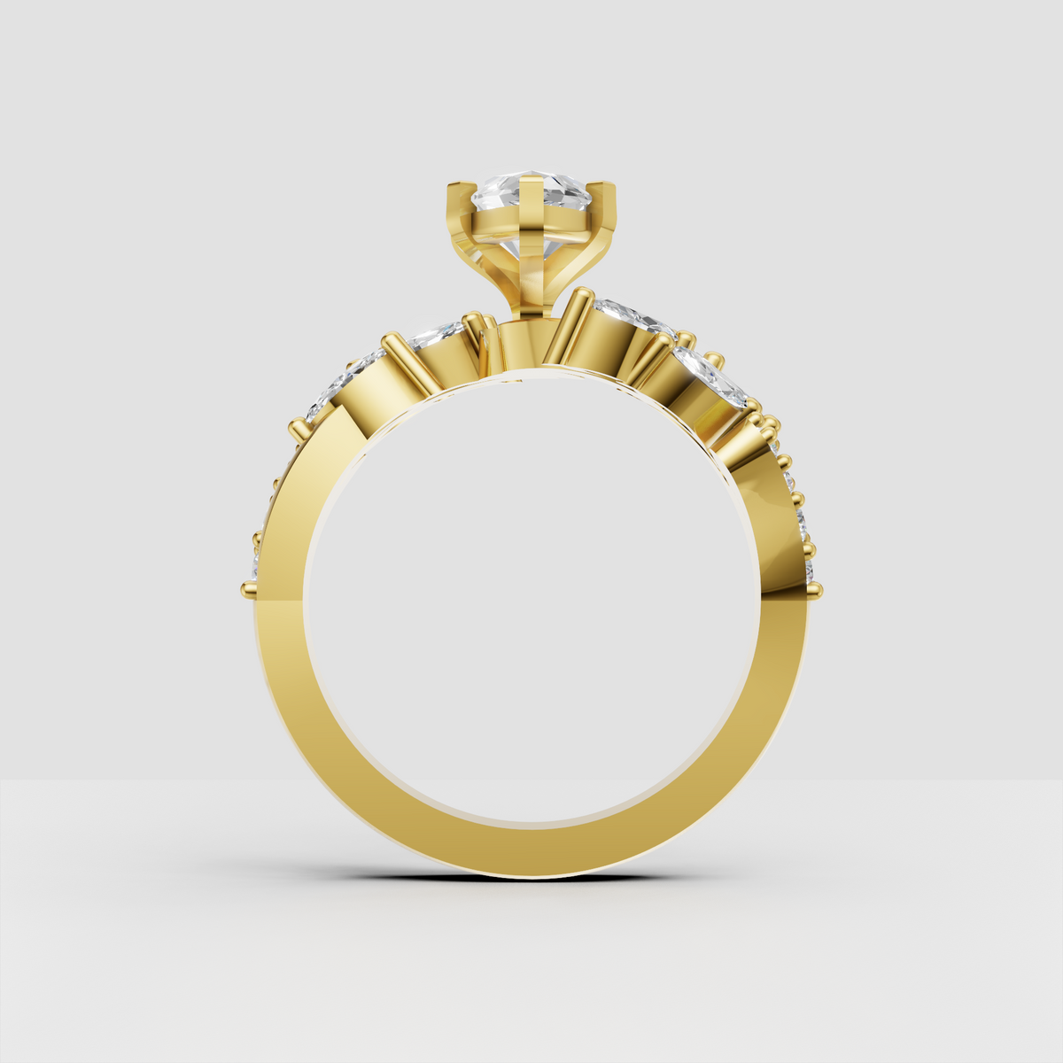 Yellow gold marquise diamond bypass ring with round accents