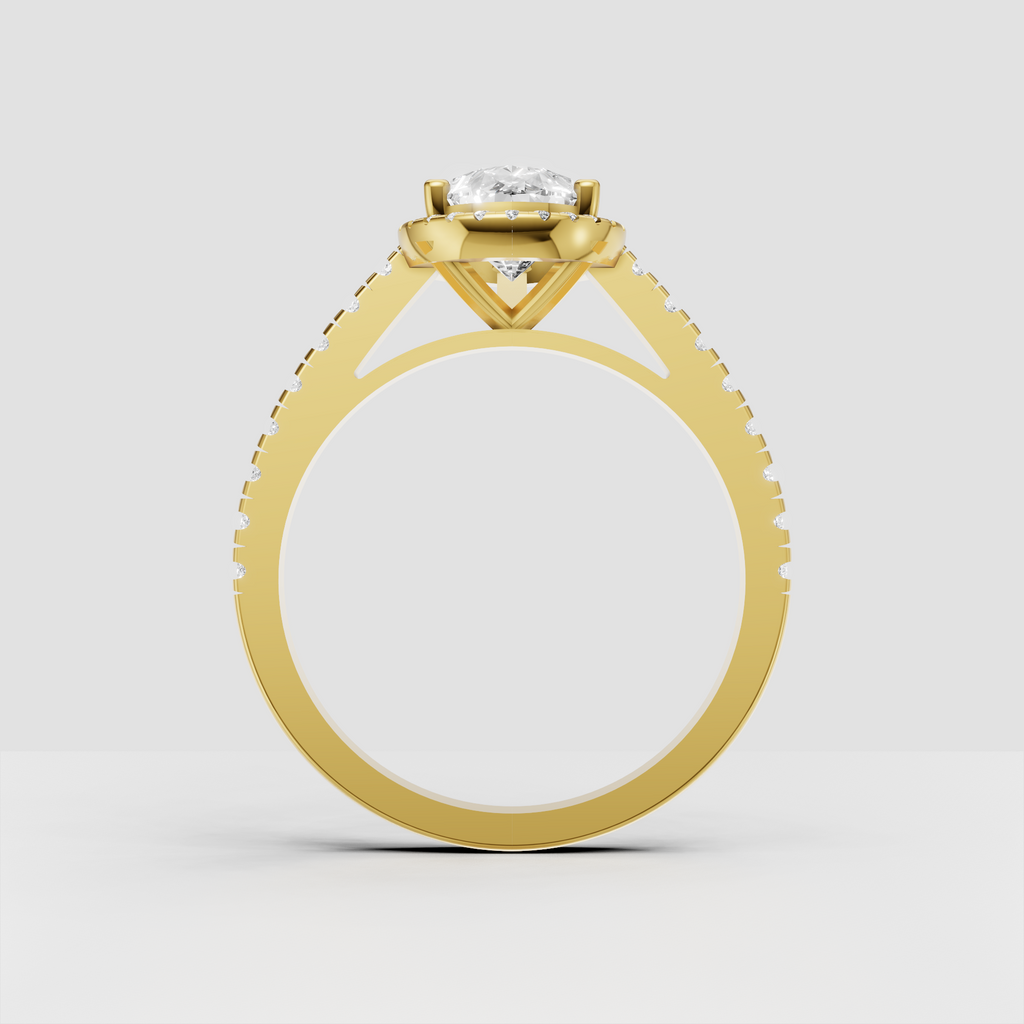 Yellow gold pear diamond halo ring with detailed pave band