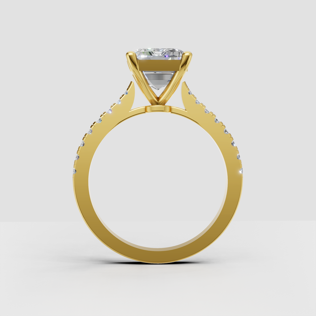 Yellow gold emerald cut solitaire ring with diamond accents