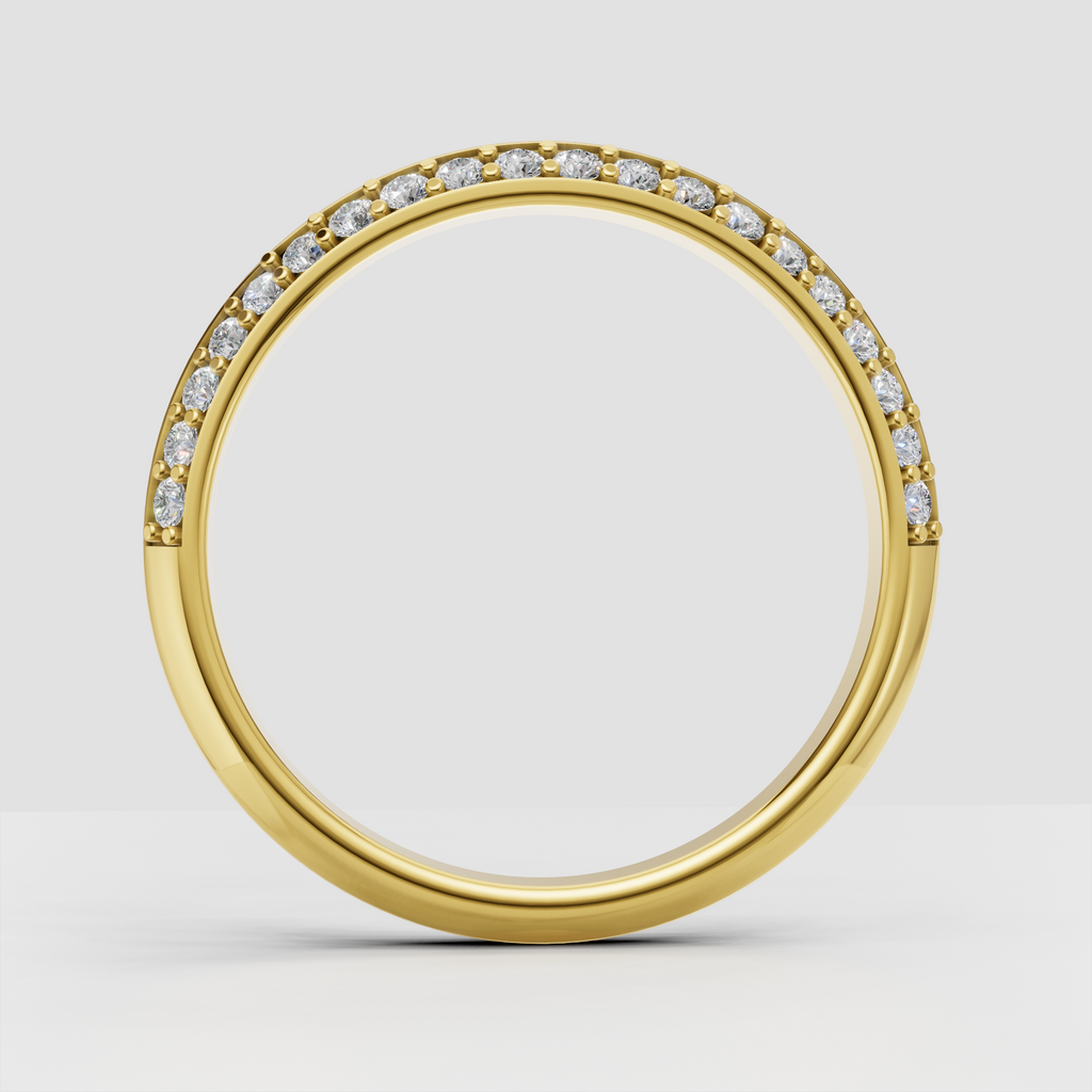 Elegant curved diamond wedding band with bead setting