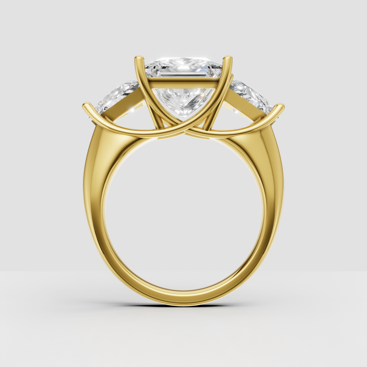 Square princess cut diamond ring with three stone setting