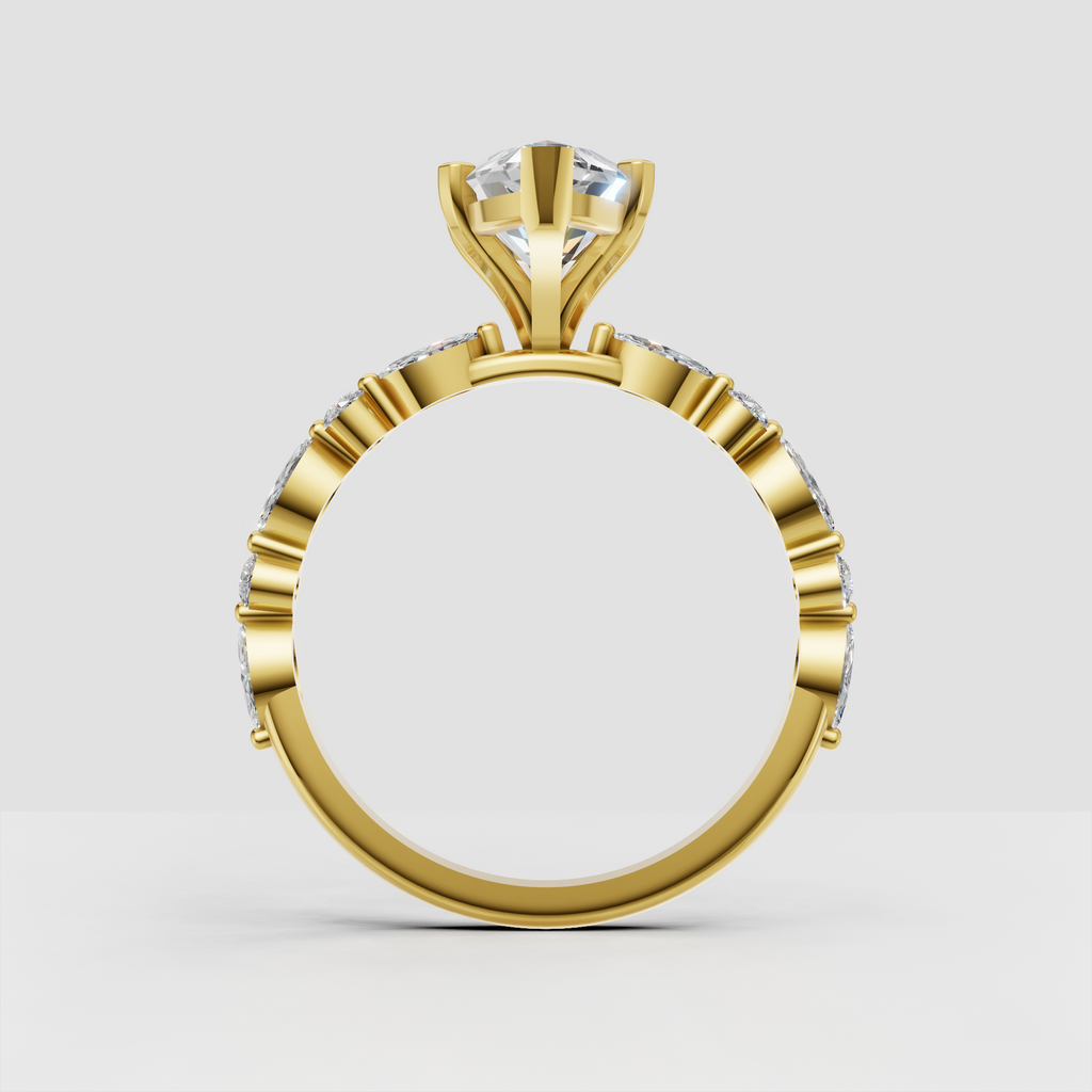Marquise solitaire engagement ring with detailed side stone band in polished gold.