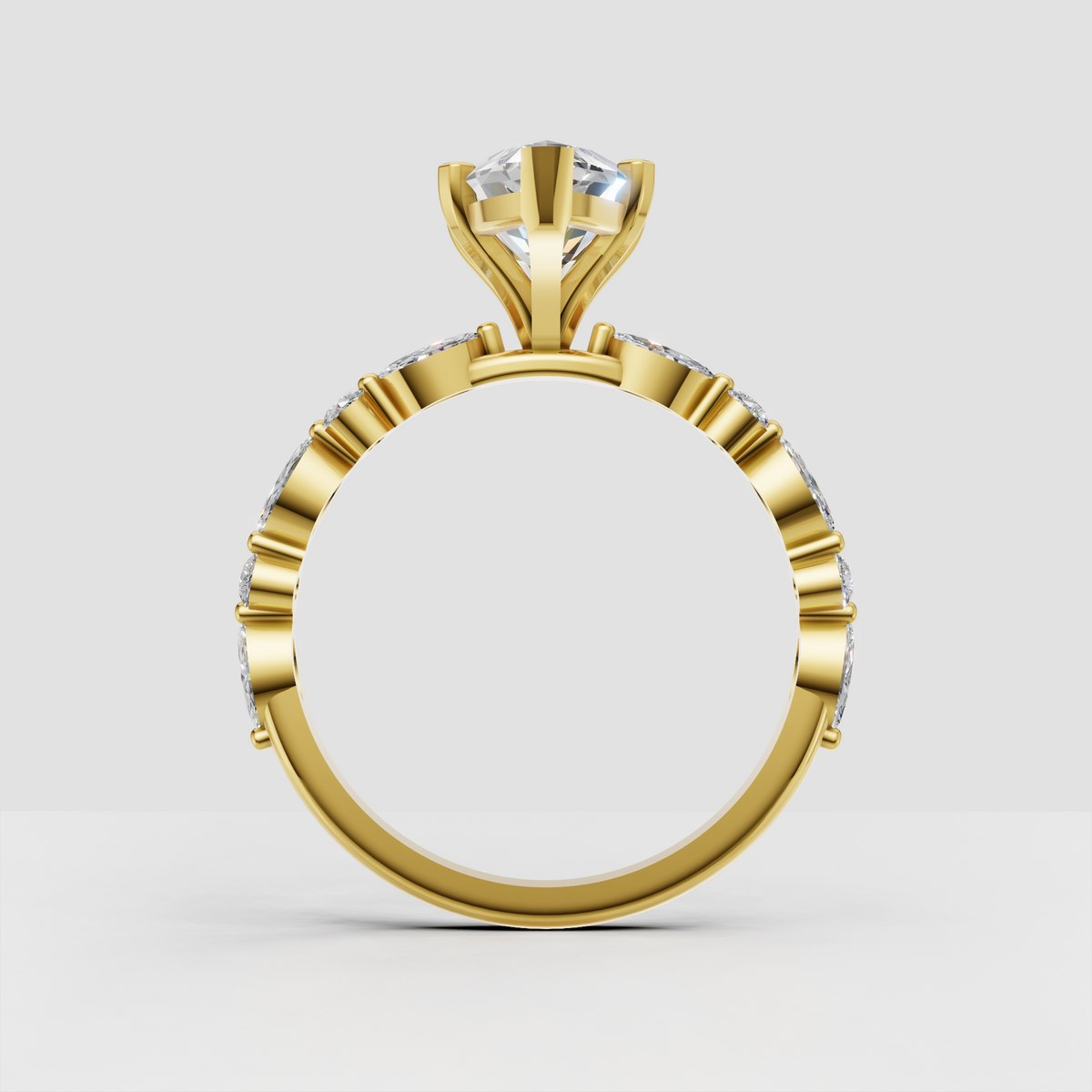 Marquise solitaire engagement ring with detailed side stone band in polished gold.