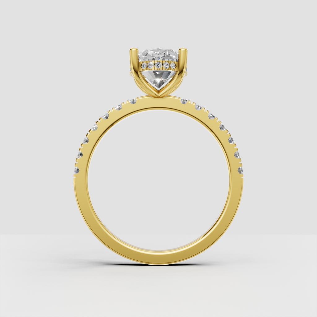 Oval center diamond ring with four prongs and pavé side stones