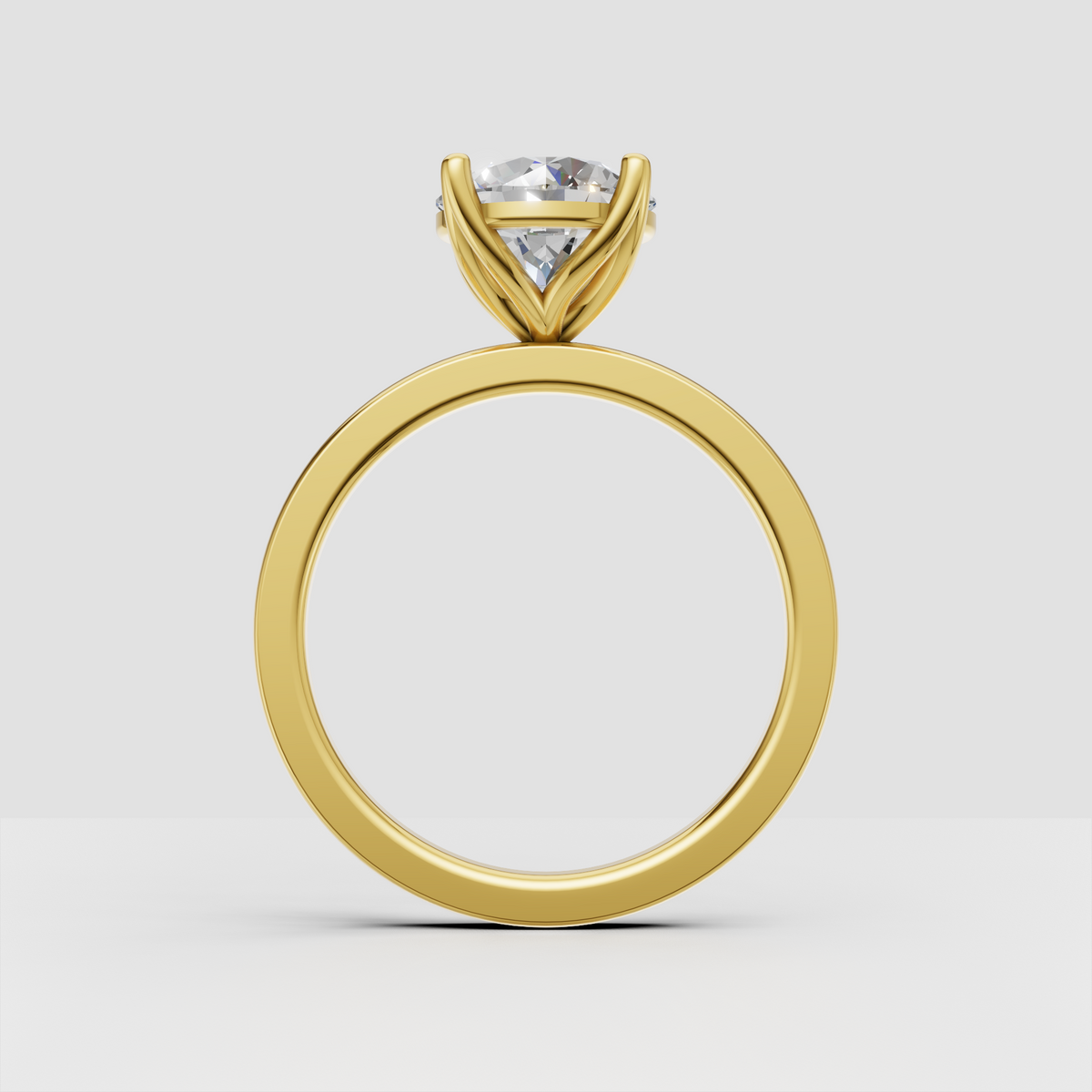 Classic round diamond engagement ring with four-prong setting