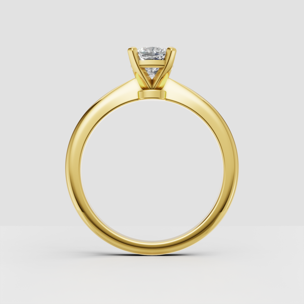 Cushion cut center stone four-prong Diamond ring