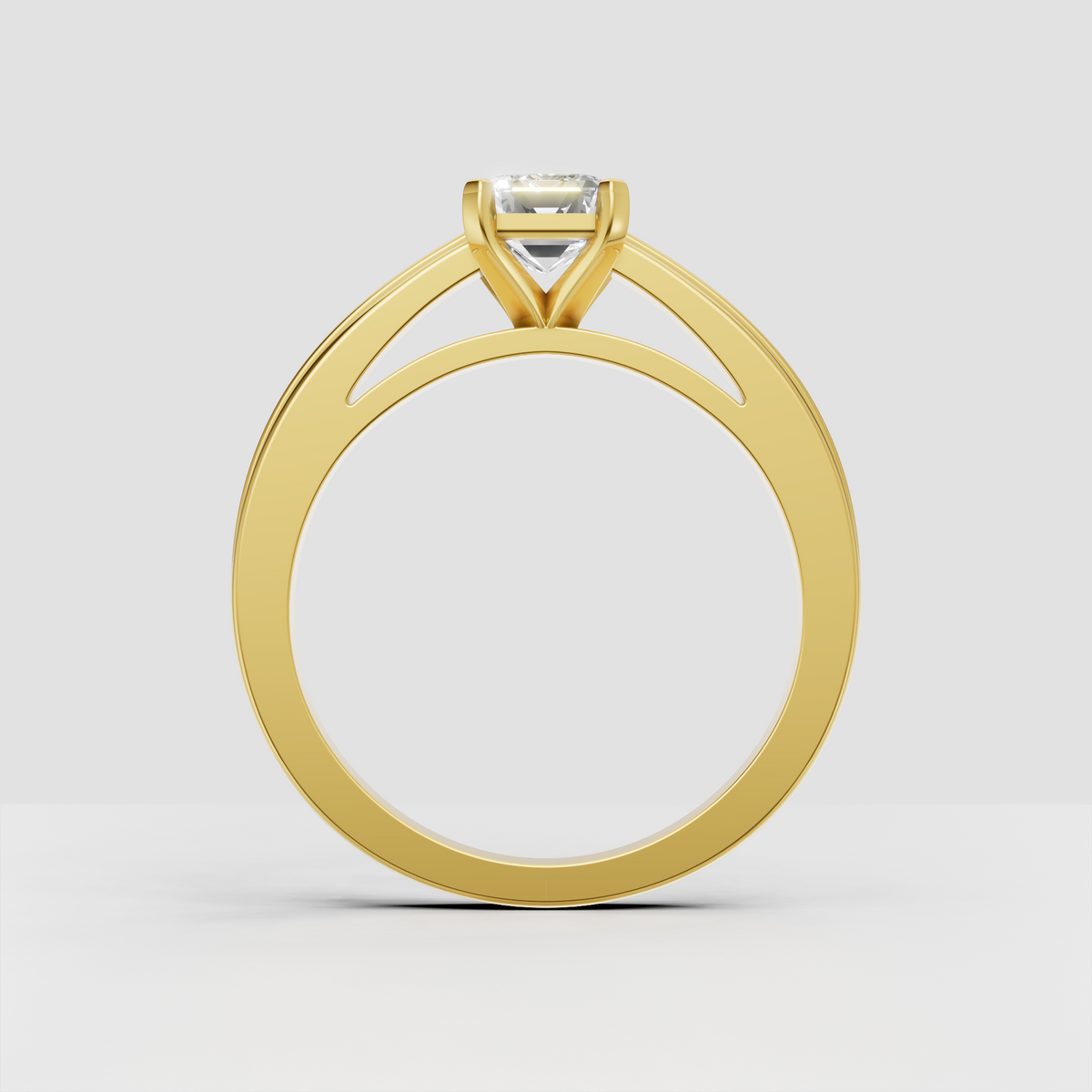 Emerald cut diamond ring with elevated cathedral-style setting