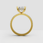 Yellow gold radiant cut engagement ring with concealed halo