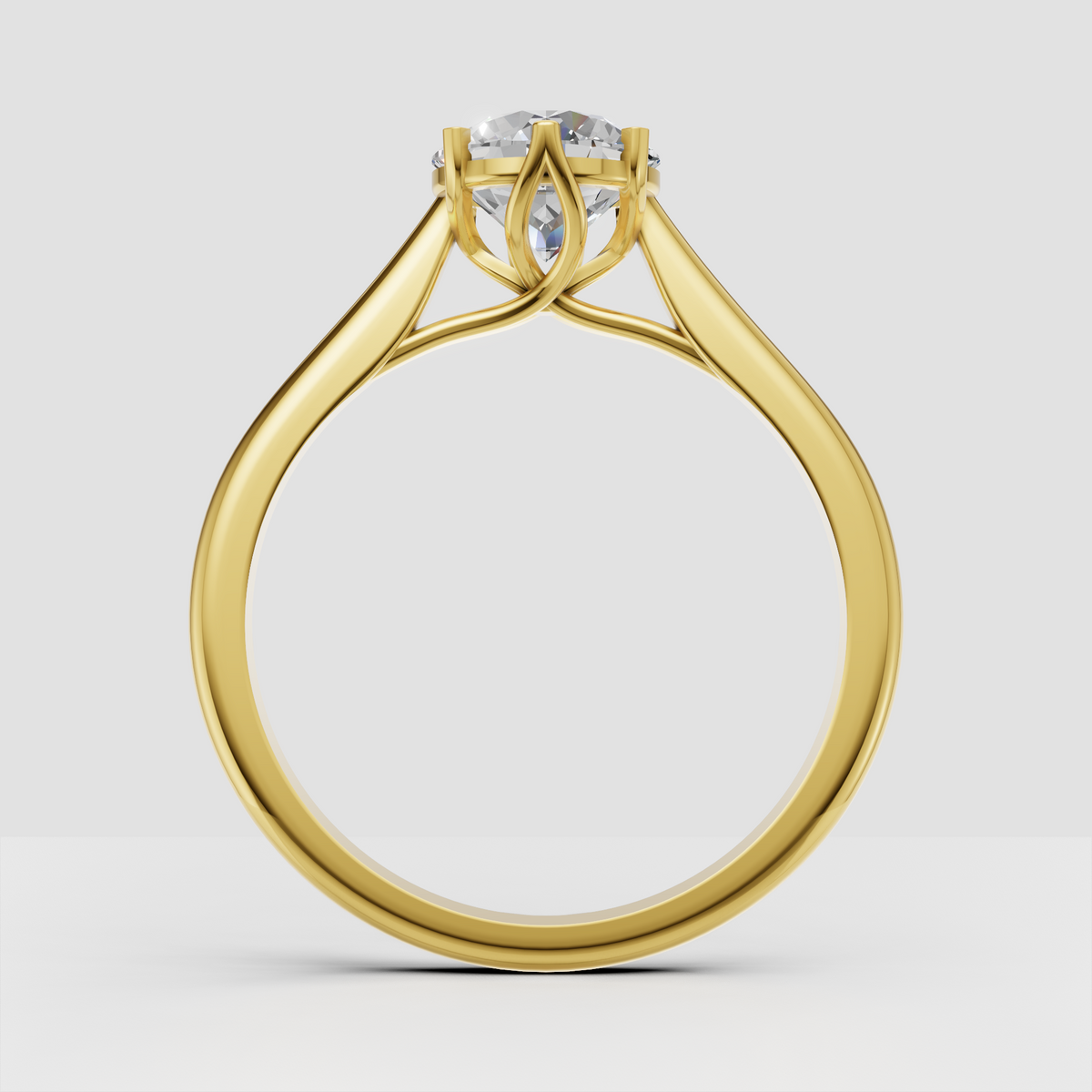 Classic round diamond solitaire ring in yellow gold