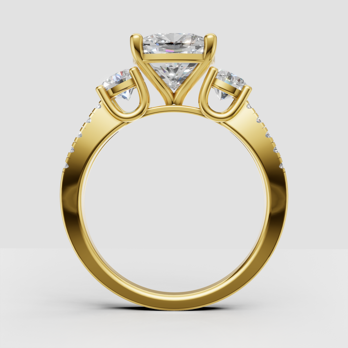 Yellow gold three stone diamond engagement ring