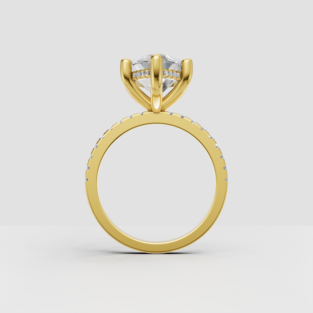 Marquise center stone ring with six rounded prongs