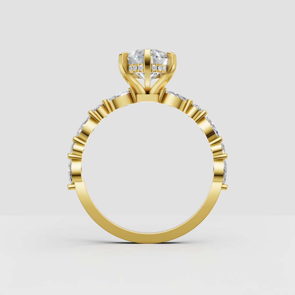 Yellow gold marquise diamond ring with pavé shoulders