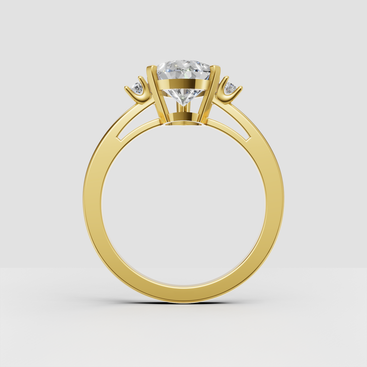 Pear diamond three stone engagement ring