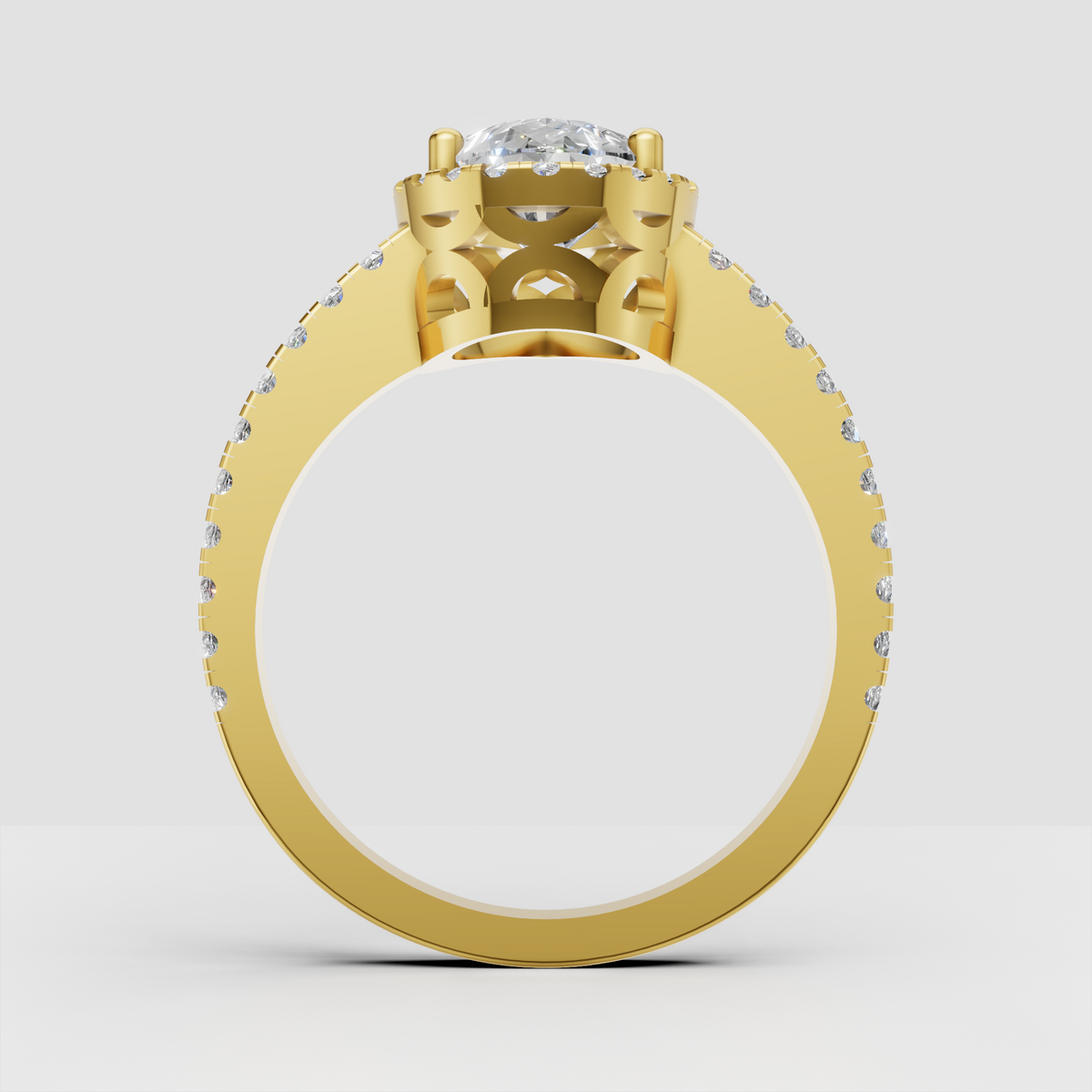 Pear cut diamond halo ring with sparkling pavé shoulders