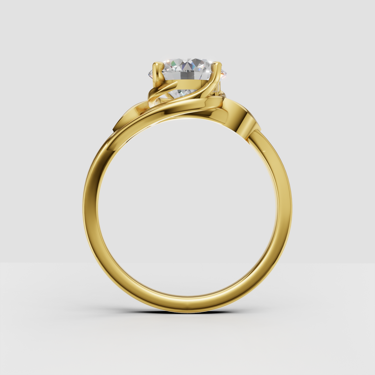 Round cut diamond ring with elegant leaf motifs and polished gold band