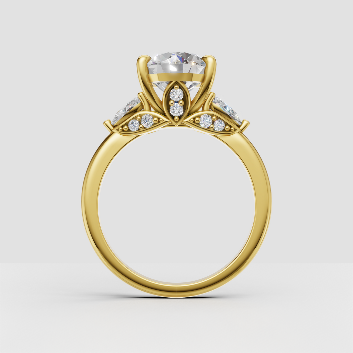 Three-stone diamond engagement ring with pave accents
