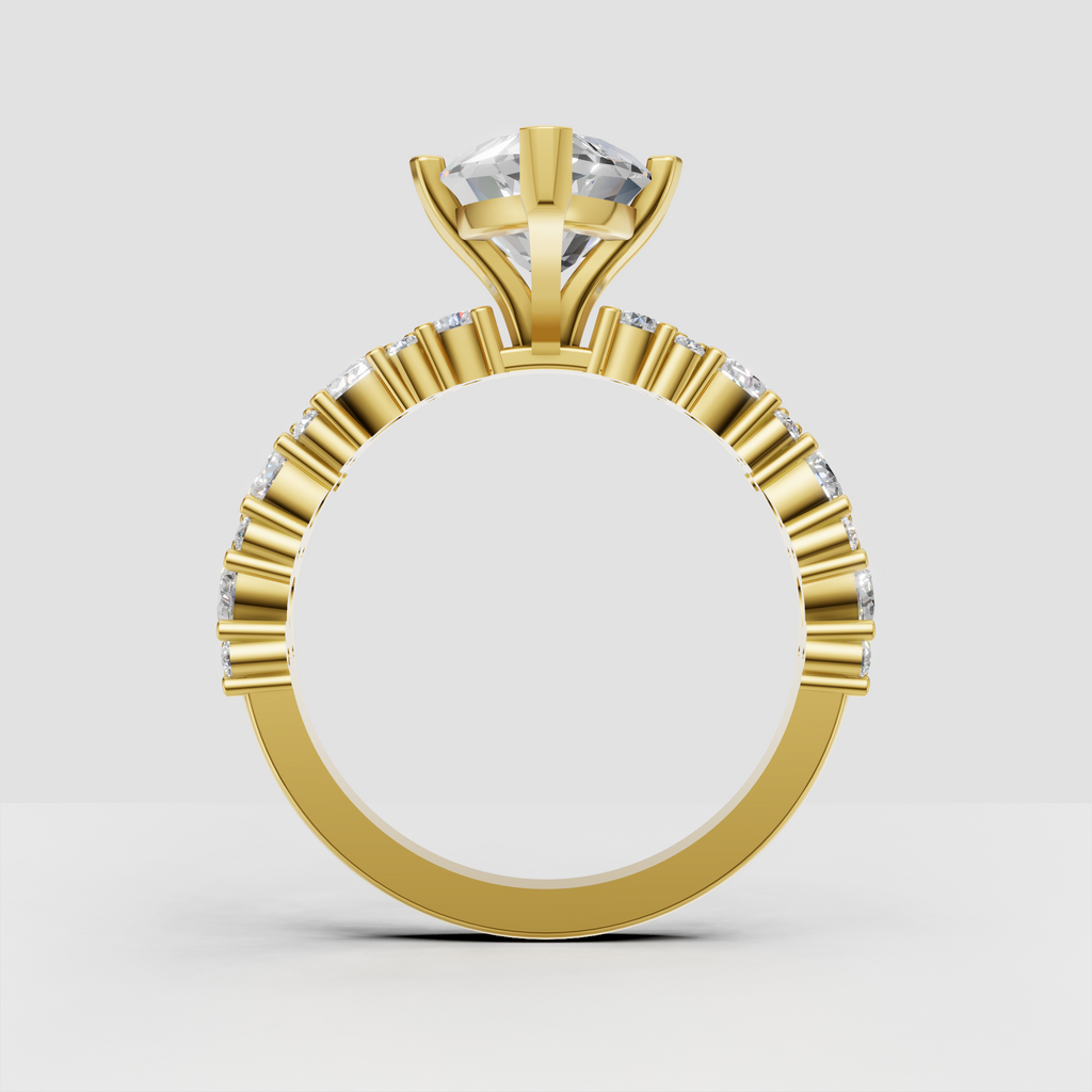 Gold marquise diamond ring with detailed prong setting
