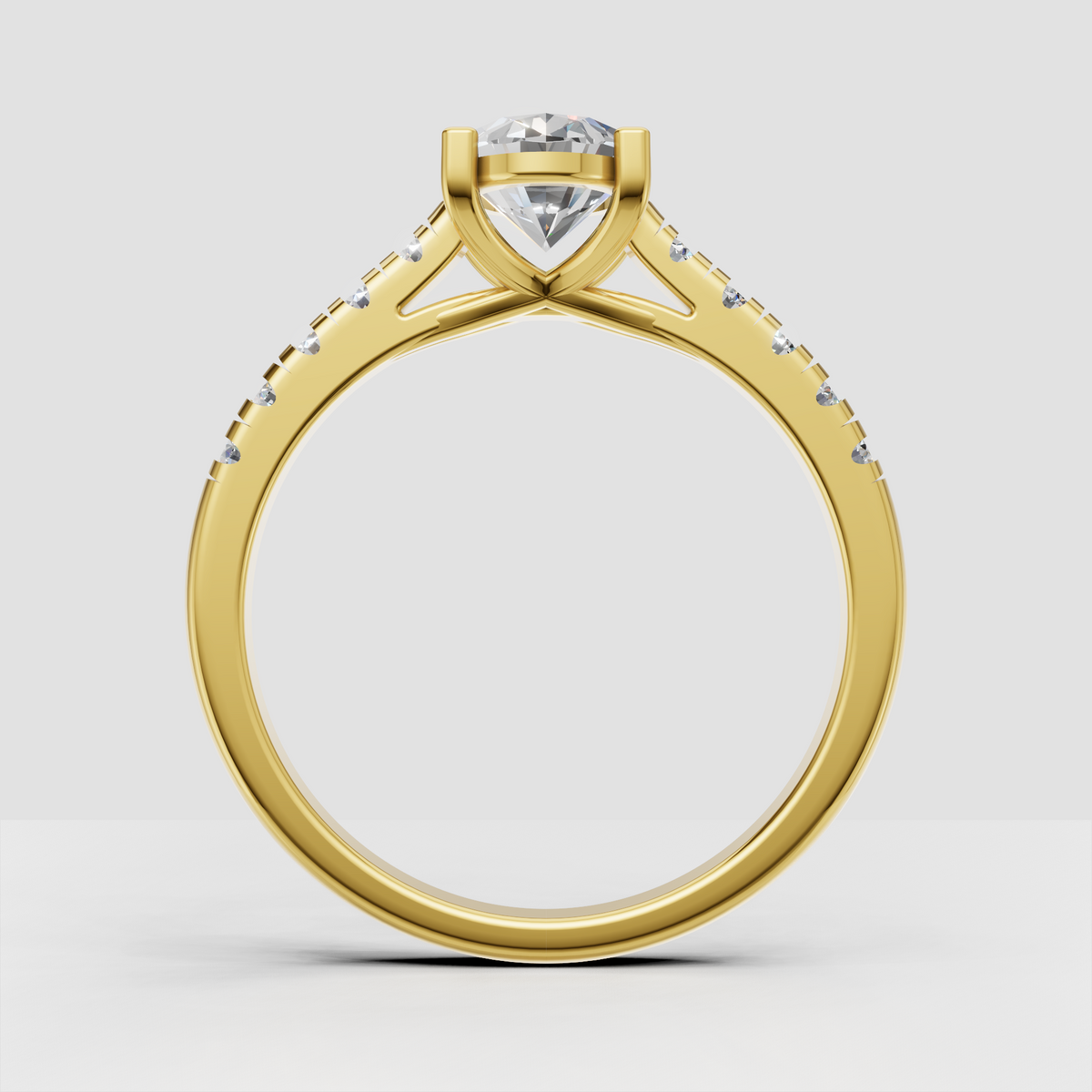 Elegant oval diamond engagement ring in polished yellow gold