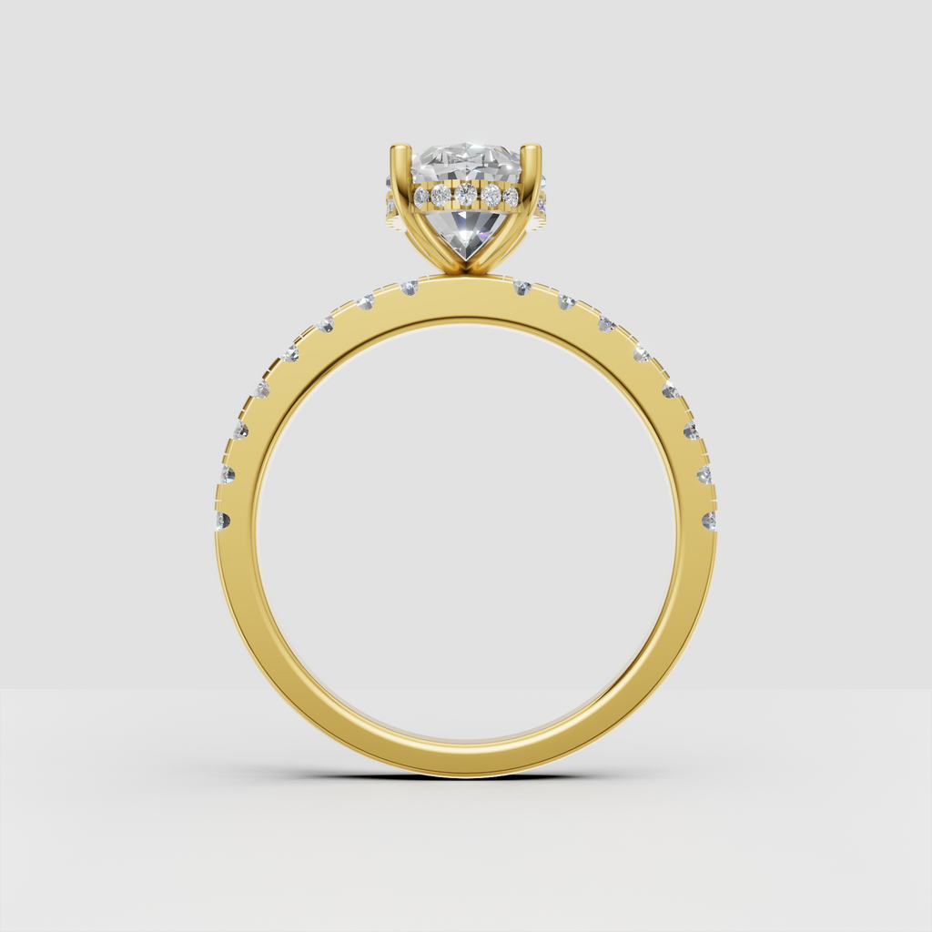Elegant pear diamond engagement ring with pavé-set round stones along the band