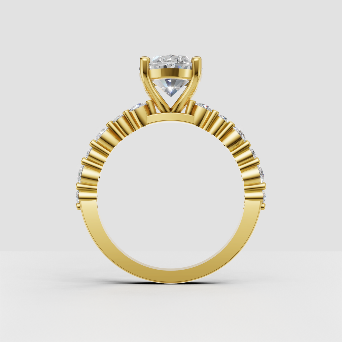 Yellow gold oval diamond engagement ring with split shoulders