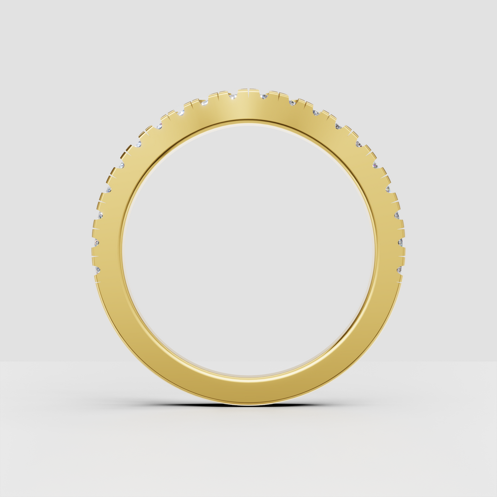 Polished yellow gold band featuring closely set round diamonds
