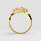 Yellow gold three stone engagement ring with round diamonds