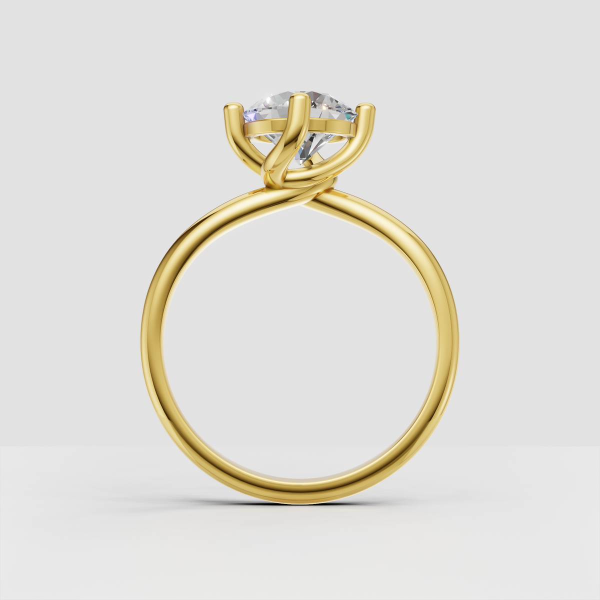 Round center stone ring with four sculpted prongs