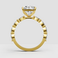 Radiant cut solitaire ring with sparkling diamond shoulders