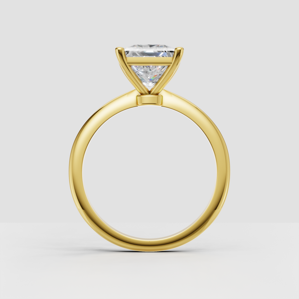 Square princess cut diamond solitaire engagement ring with sleek yellow gold band
