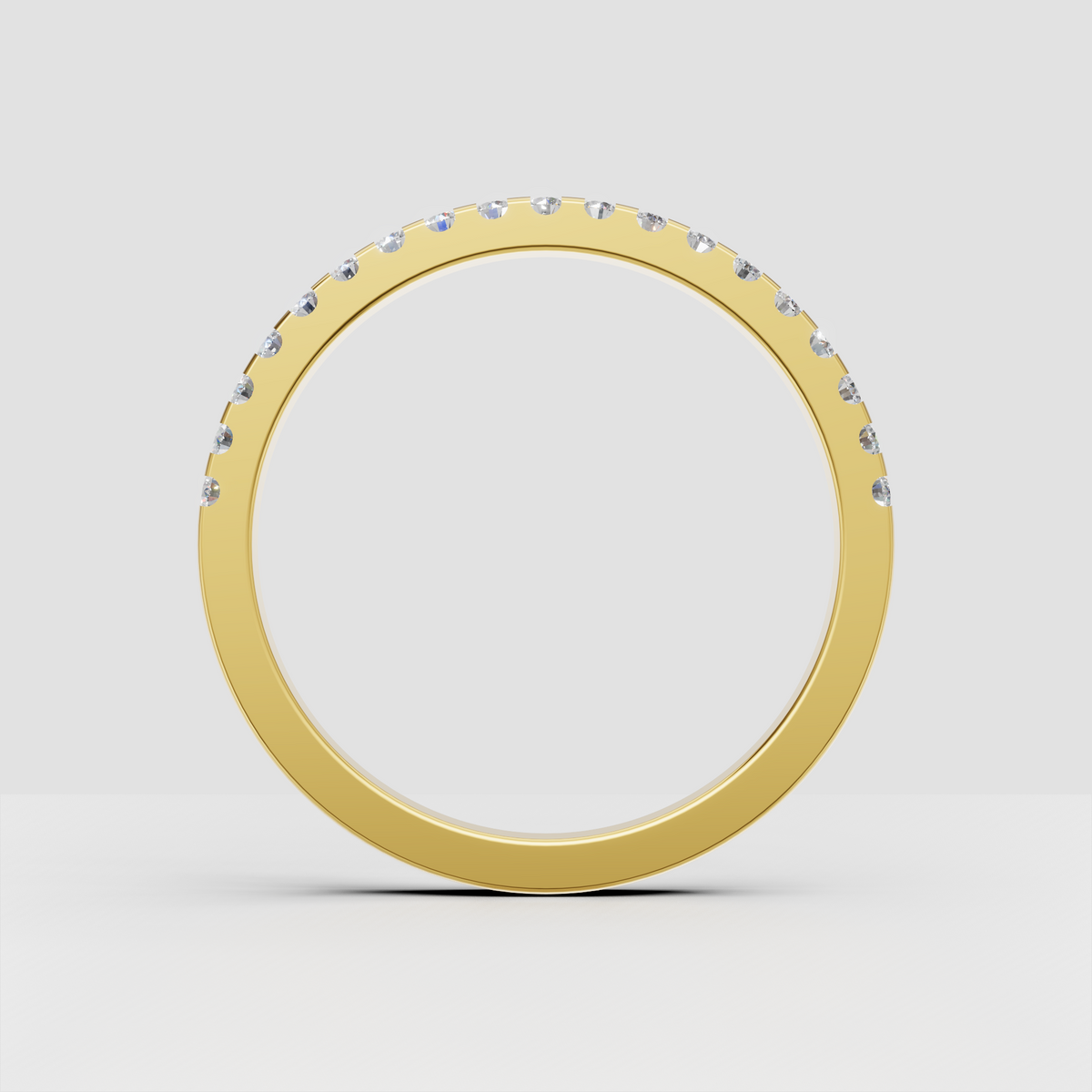 Round cut diamond band featuring closely set brilliant stones