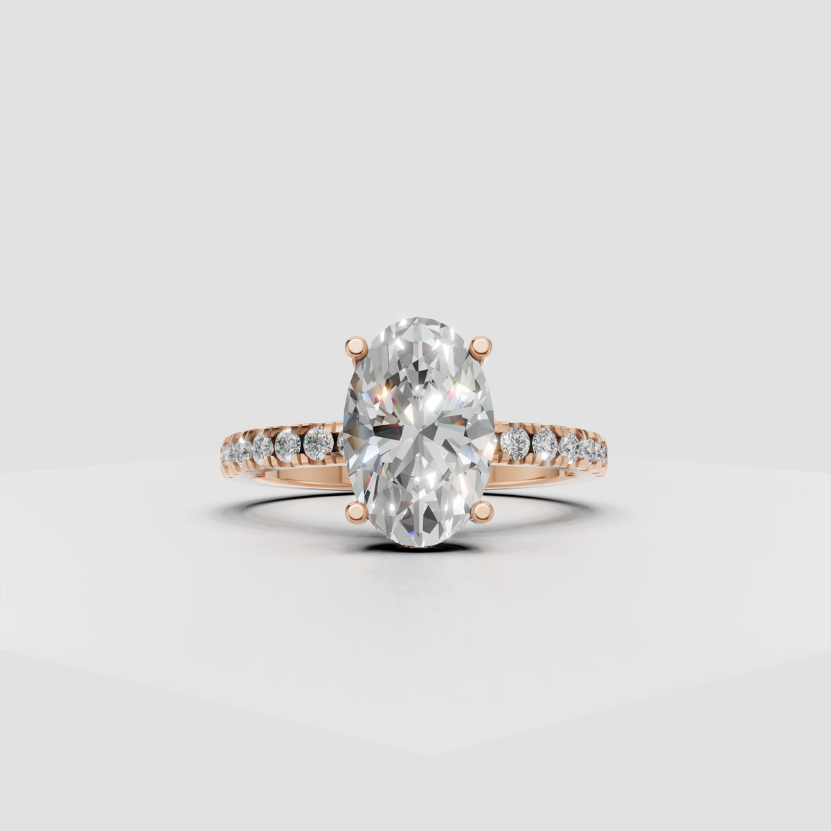 Elegant oval diamond engagement ring with concealed halo setting