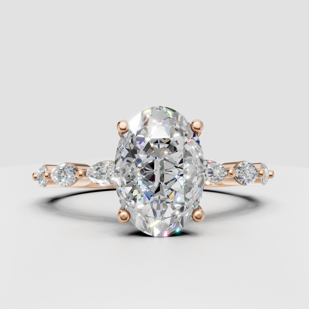Polished yellow gold ring featuring oval center diamond and side accents