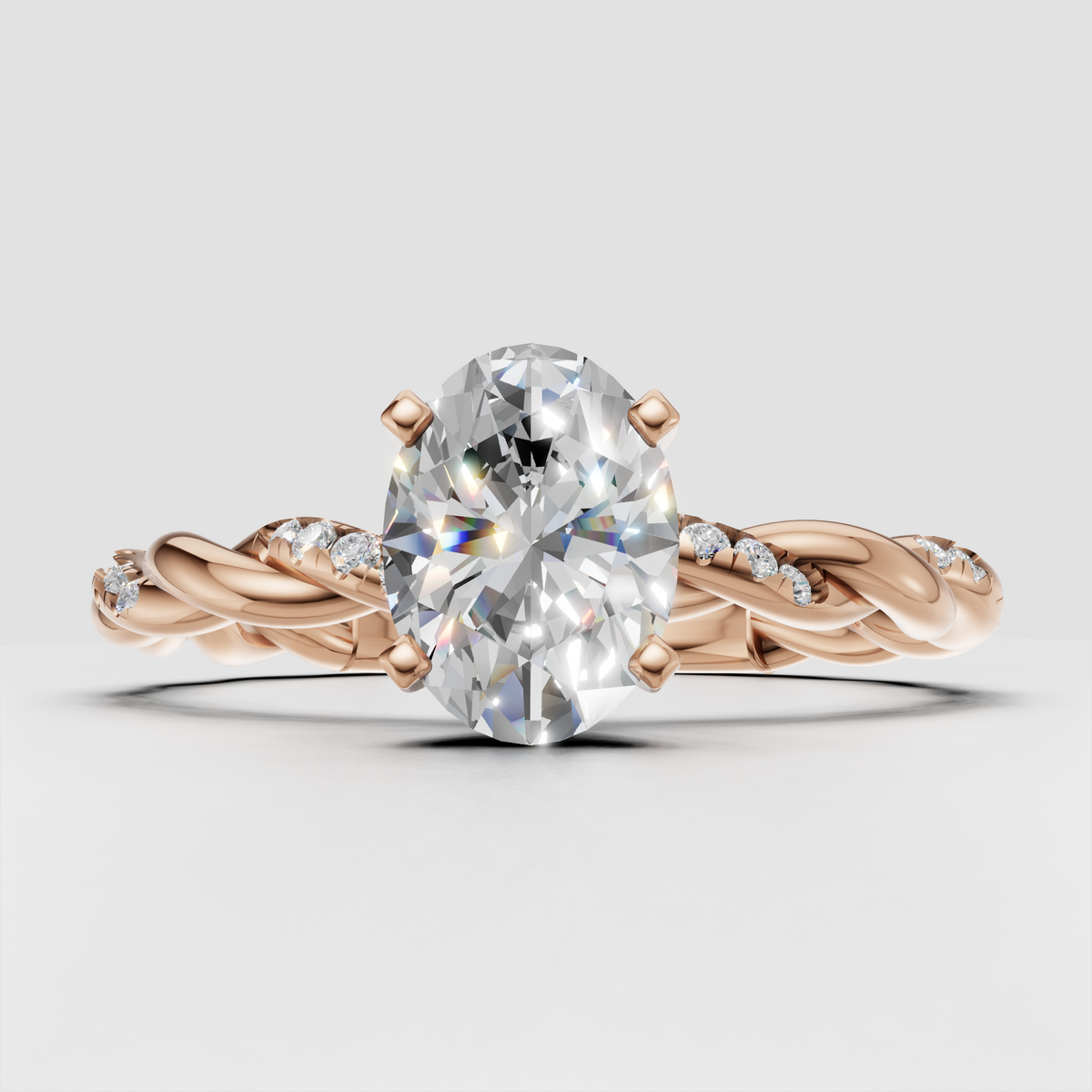 Yellow gold twisted oval diamond bridal ring